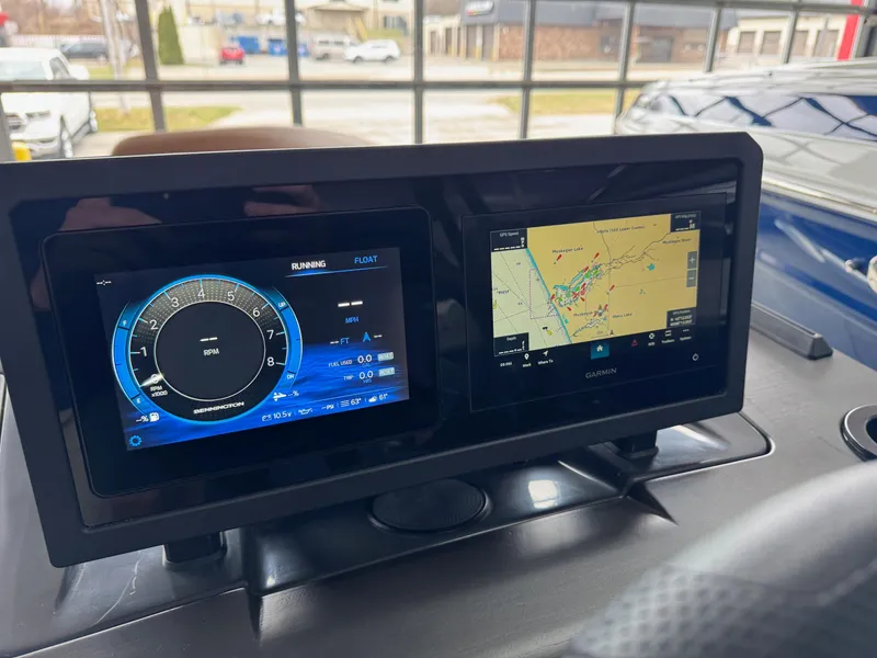Slide: The Image of Dashboard of 2025 Bennington 24 MFB with navigation and RPM display. - 3