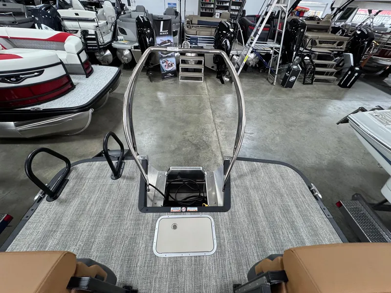 Slide: The Image of 2025 Bennington 24 MFB pontoon boat interior with modern seating and sleek design. - 7
