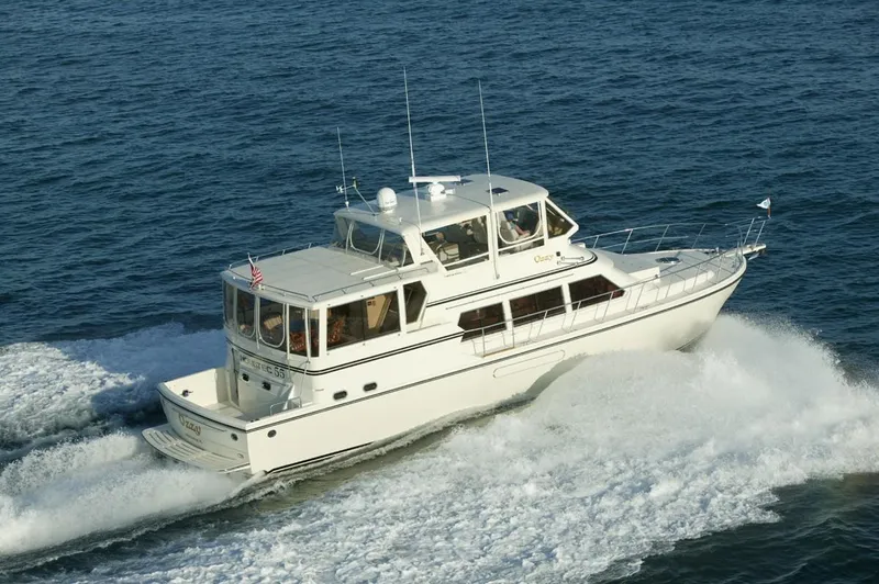 The Image of 2004 Novatec Islander CPMY yacht cruising on open water. - 0