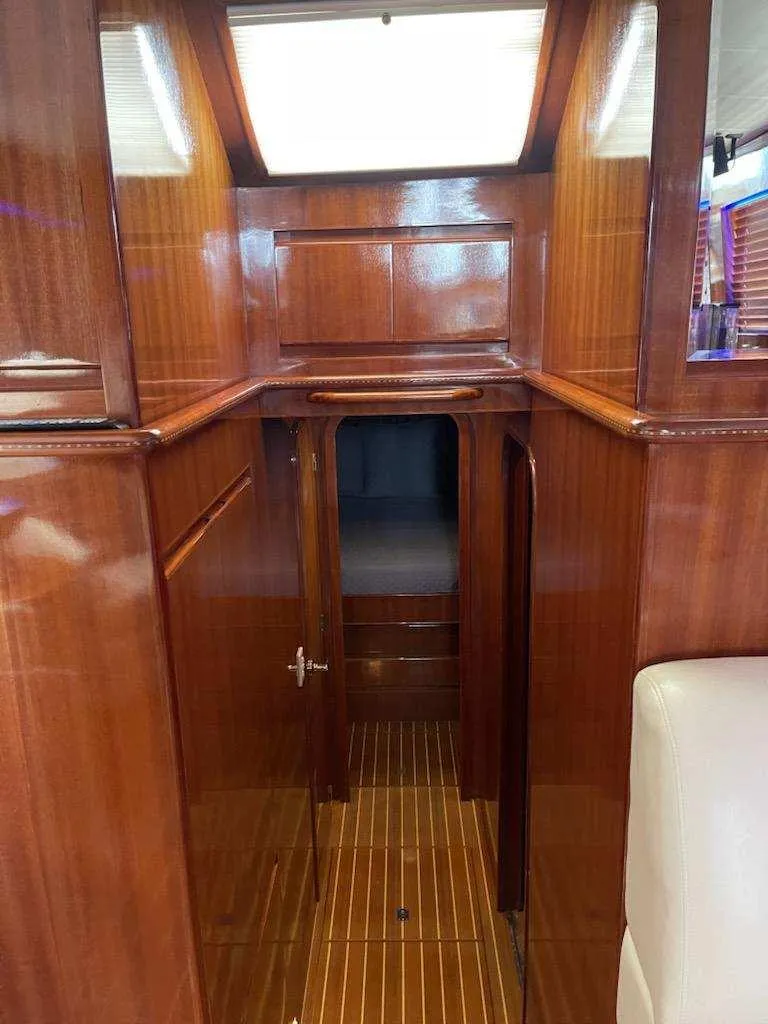 Slide: The Image of Interior of 2004 Novatec Islander CPMY yacht with polished wood finish. - 41