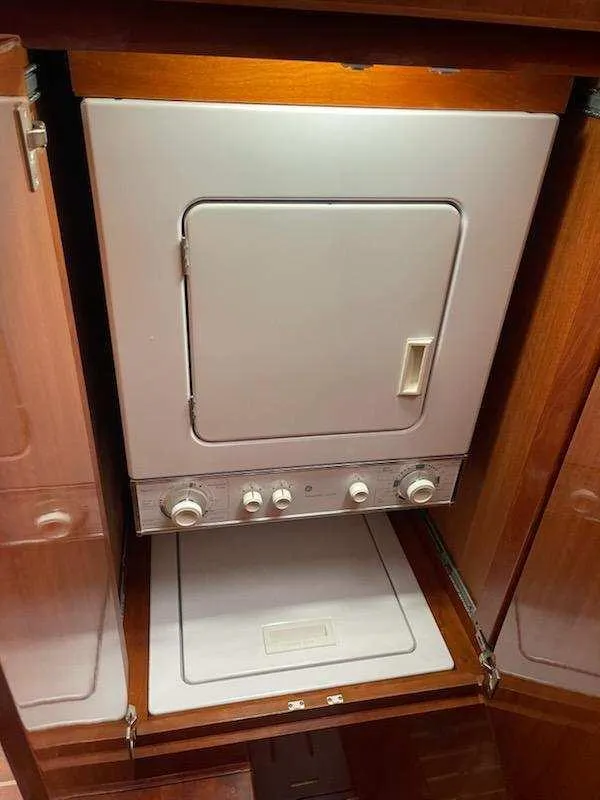 Slide: The Image of 2004 Novatec Islander CPMY laundry unit with wooden cabinetry. - 43