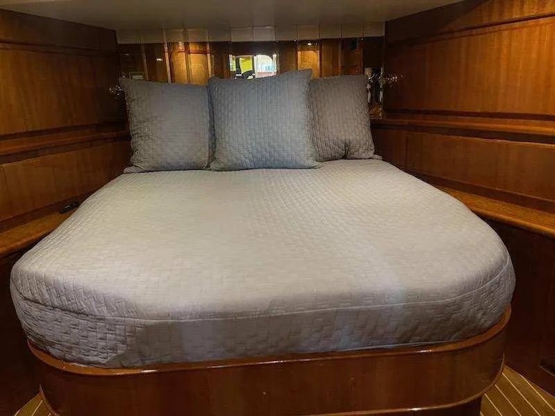 Slide: The Image of Luxurious 2004 Novatec Islander CPMY cabin with cozy bed and elegant wood finish. - 49