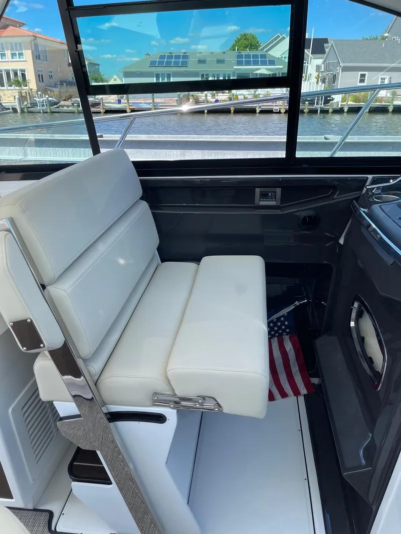 Slide: The Image of 2017 Monterey 360 Sport Coupe cockpit with modern controls and steering wheel. - 10