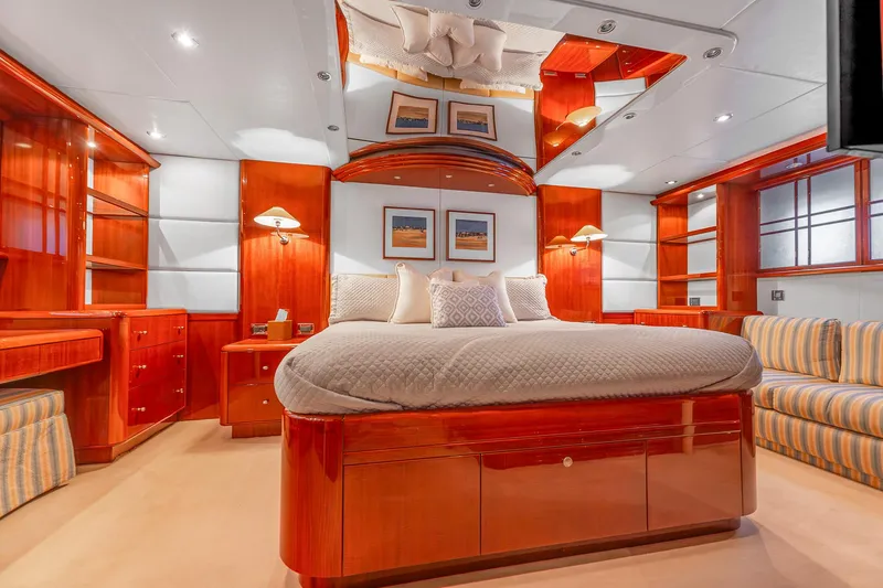 Slide: The Image of Luxurious bedroom interior of 2002 Lazzara 80 Skylounge yacht with elegant wood finishes. - 35