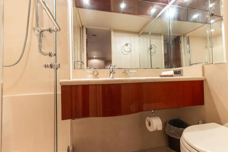 Slide: The Image of Luxurious bathroom in 2002 Lazzara 80 Skylounge yacht with modern fixtures and elegant design. - 41