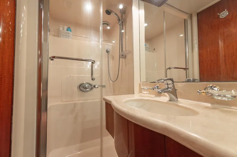 Slide: The Image of Luxurious bathroom in 2002 Lazzara 80 Skylounge yacht with modern shower and elegant sink. - 45