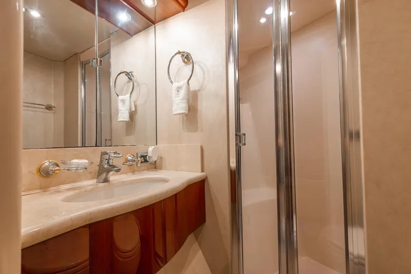 Slide: The Image of Luxurious bathroom in 2002 Lazzara 80 Skylounge yacht with elegant fixtures and shower. - 46