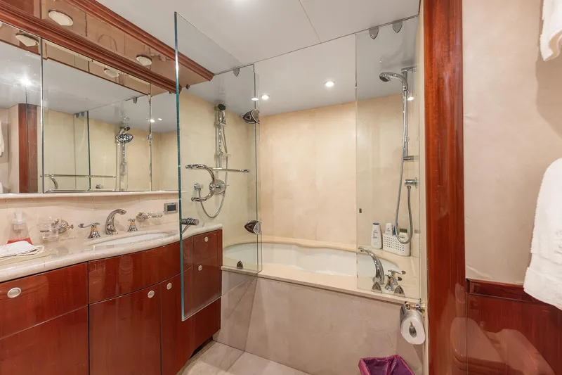 Slide: The Image of Luxurious bathroom on 2002 Lazzara 80 Skylounge yacht with glass shower and elegant fixtures. - 47