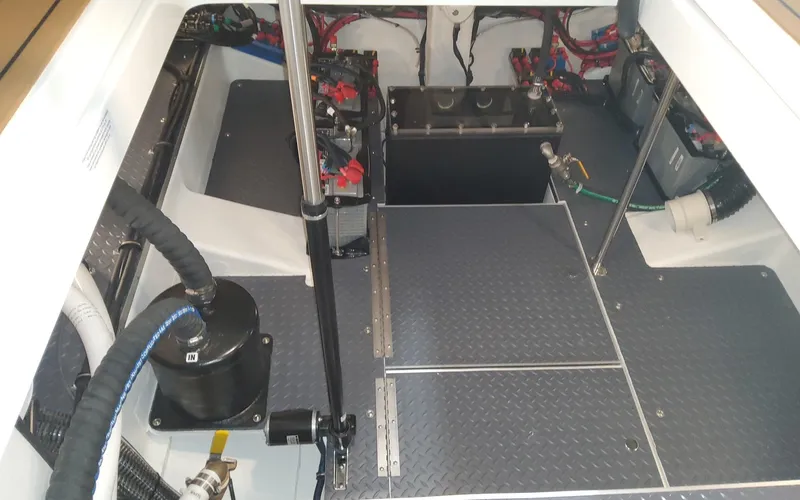 Slide: The Image of Engine compartment of 2022 Formula 400 Super Sport Crossover, showcasing mechanical components and wiring. - 20