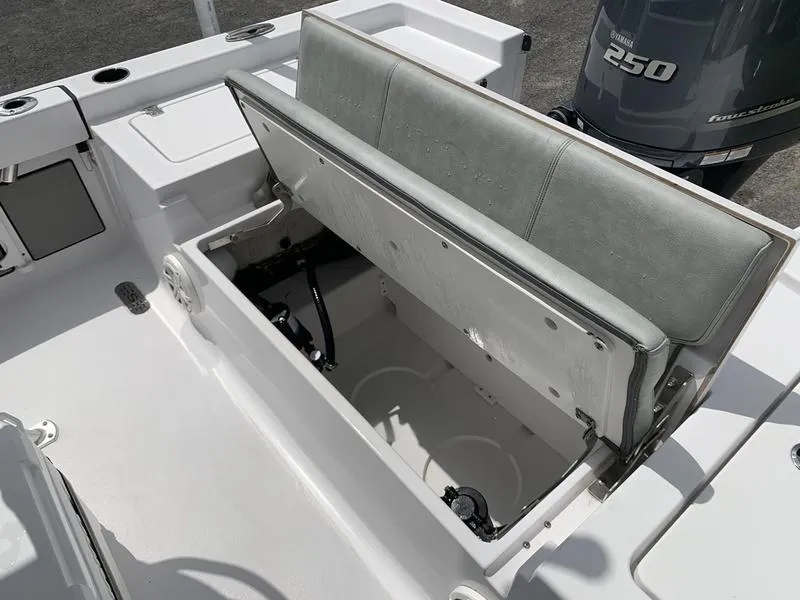 Slide: The Image of 2020 Sportsman Masters 227 boat with open storage compartment and Yamaha 250 engine. - 10