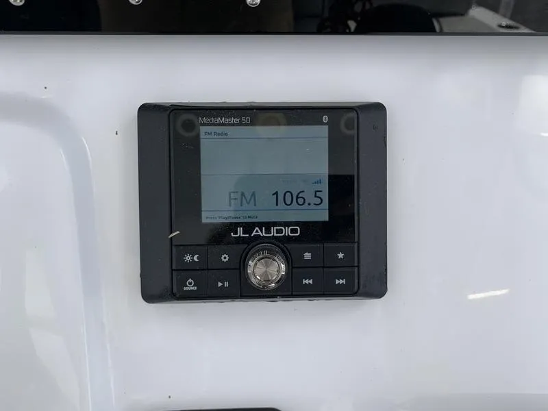 Slide: The Image of JL Audio MediaMaster 50 radio display on a 2020 Sportsman Masters 227 boat. - 21