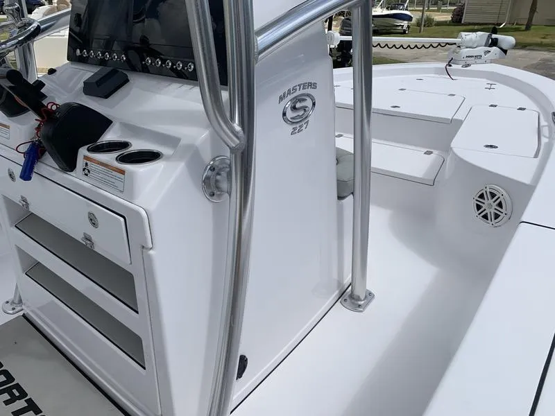 Slide: The Image of 2020 Sportsman Masters 227 boat interior with console and seating area. - 24