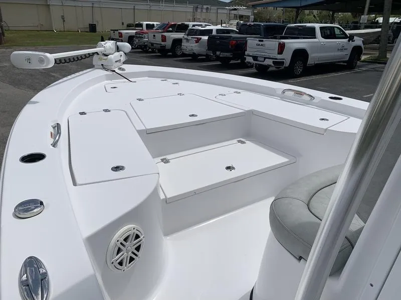 Slide: The Image of 2020 Sportsman Masters 227 boat interior with seating and storage compartments. - 26