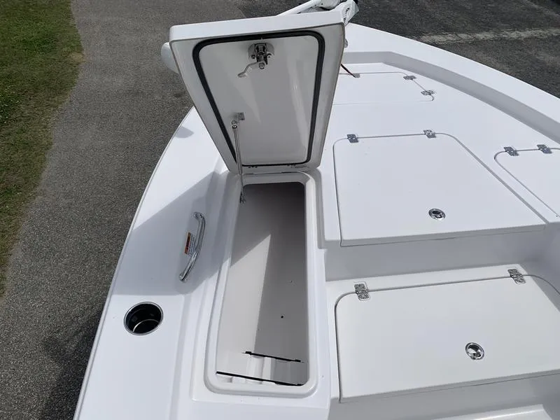 Slide: The Image of Open storage compartment on 2020 Sportsman Masters 227 boat deck. - 27
