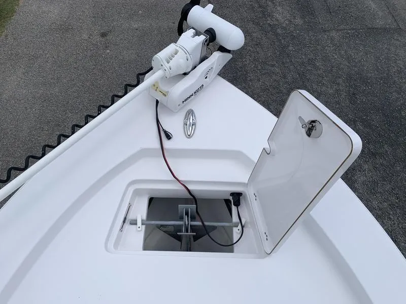 Slide: The Image of 2020 Sportsman Masters 227 boat with open anchor hatch and trolling motor. - 32