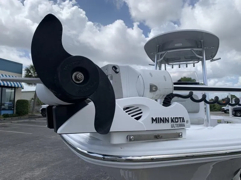 Slide: The Image of Minn Kota Ulterra motor on 2020 Sportsman Masters 227 boat, under cloudy sky. - 33