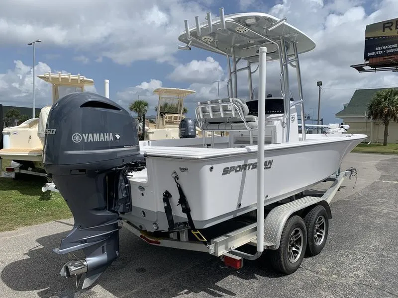 Slide: The Image of 2020 Sportsman Masters 227 boat with Yamaha engine on a trailer, parked outdoors. - 4