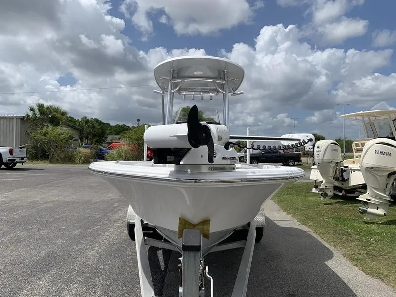 Slide: The Image of 2020 Sportsman Masters 227 boat on trailer under cloudy sky. - 7