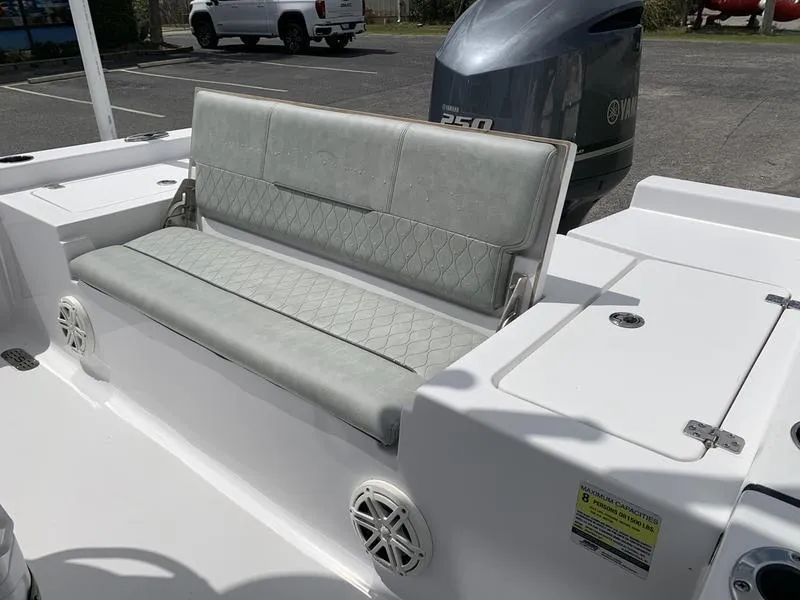 Slide: The Image of 2020 Sportsman Masters 227 boat with cushioned seating and Yamaha 250 engine. - 9