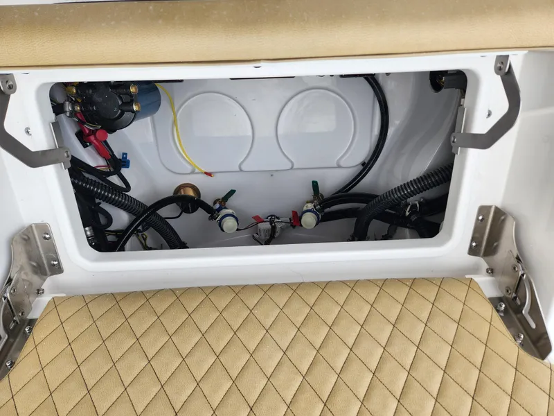 Slide: The Image of 2025 Sportsman Masters 247 Bay Boat interior wiring and components view. - 24