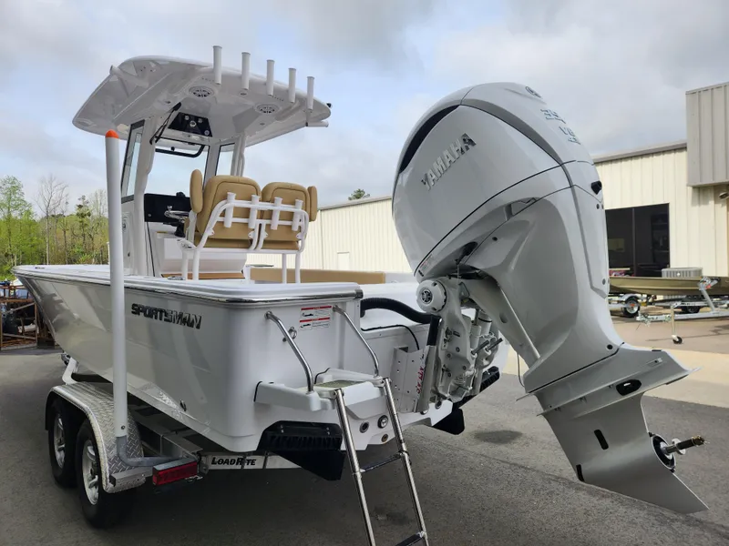 Slide: The Image of 2025 Sportsman Masters 247 Bay Boat on trailer, featuring Yamaha outboard motor. - 6