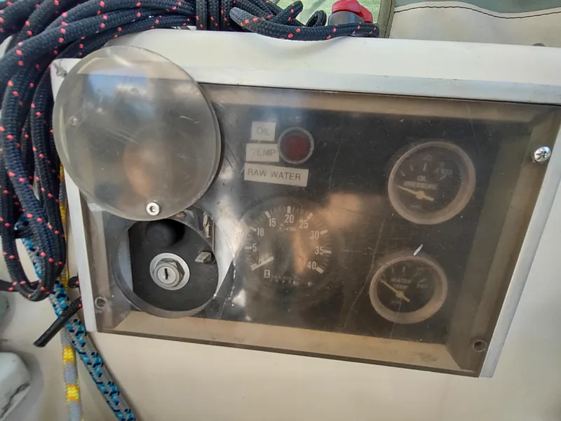 Slide: The Image of Control panel of a 1988 Cascade 42 boat with gauges and ropes. - 30