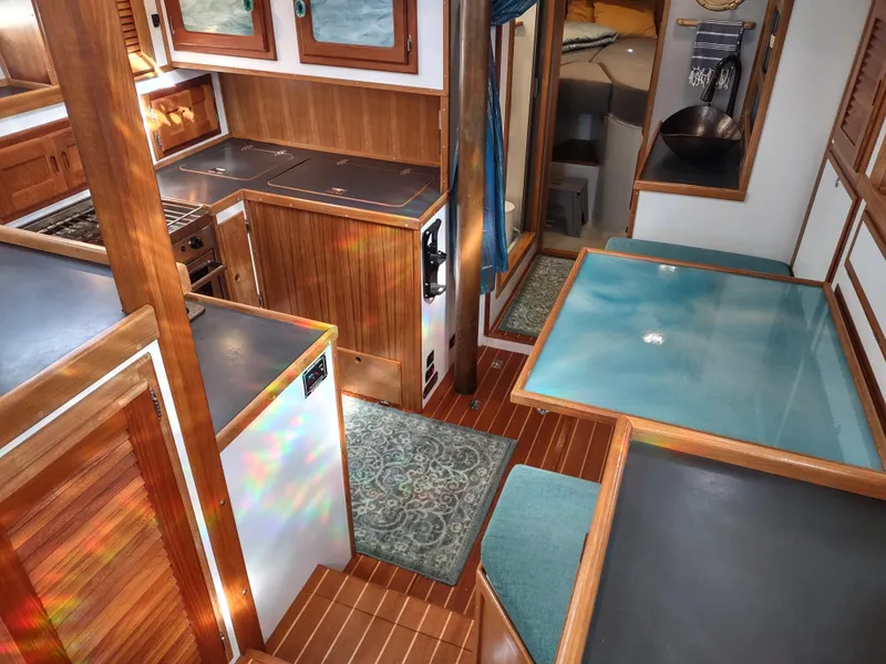 Slide: The Image of Interior of 1988 Cascade 42 sailboat with wood finish and modern amenities. - 38