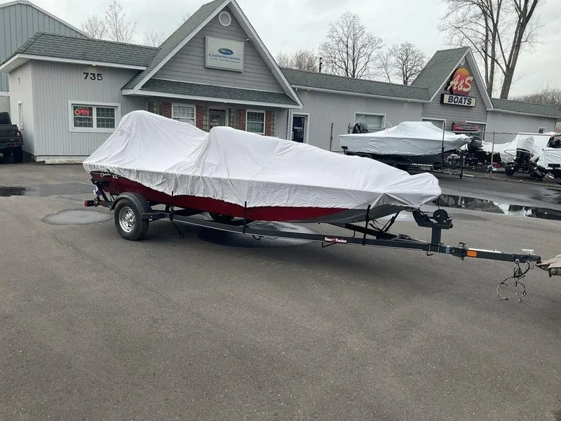 Slide: The Image of 2020 Tracker BASS TRACKER® Classic XL boat covered on trailer outside dealership. - 13