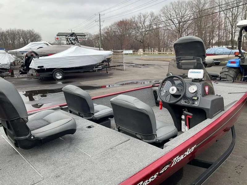 Slide: The Image of 2020 Tracker BASS TRACKER® Classic XL boat with three seats, parked outdoors. - 5