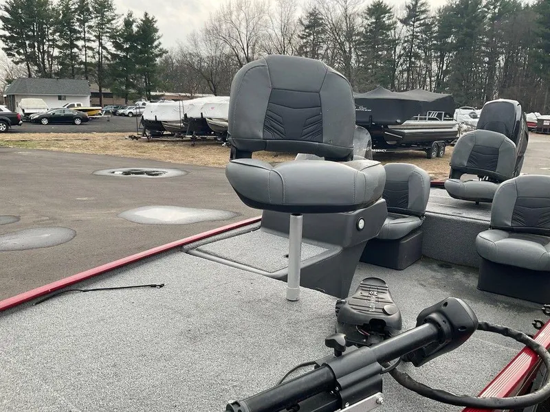 Slide: The Image of 2020 Tracker BASS TRACKER® Classic XL boat with seating and trolling motor, parked outdoors. - 7