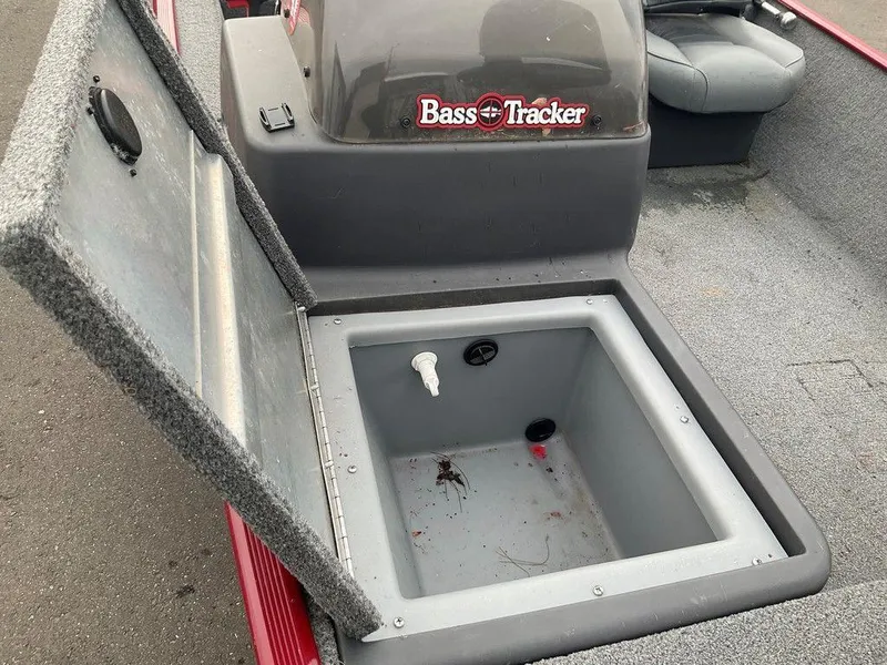 Slide: The Image of 2020 Tracker BASS TRACKER® Classic XL boat with open storage compartment. - 8