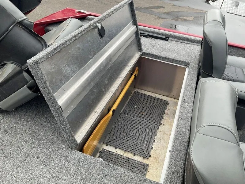 Slide: The Image of 2020 Tracker BASS TRACKER® Classic XL boat storage compartment with open lid and interior view. - 9