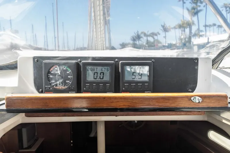 Slide: The Image of Control panel of a 1997 Hunter 456 sailboat with navigation instruments. - 30