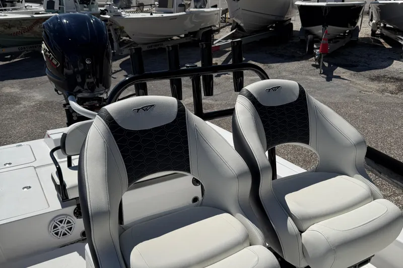 Slide: The Image of 2025 Tidewater 25 TPC Raptor boat seats with sleek design and modern upholstery. - 11