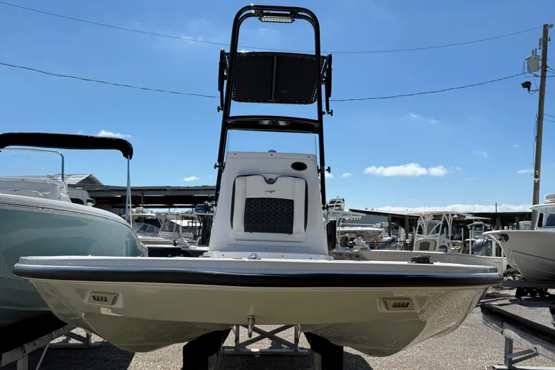 Slide: The Image of 2025 Tidewater 25 TPC Raptor boat displayed in a marina under clear blue skies. - 9