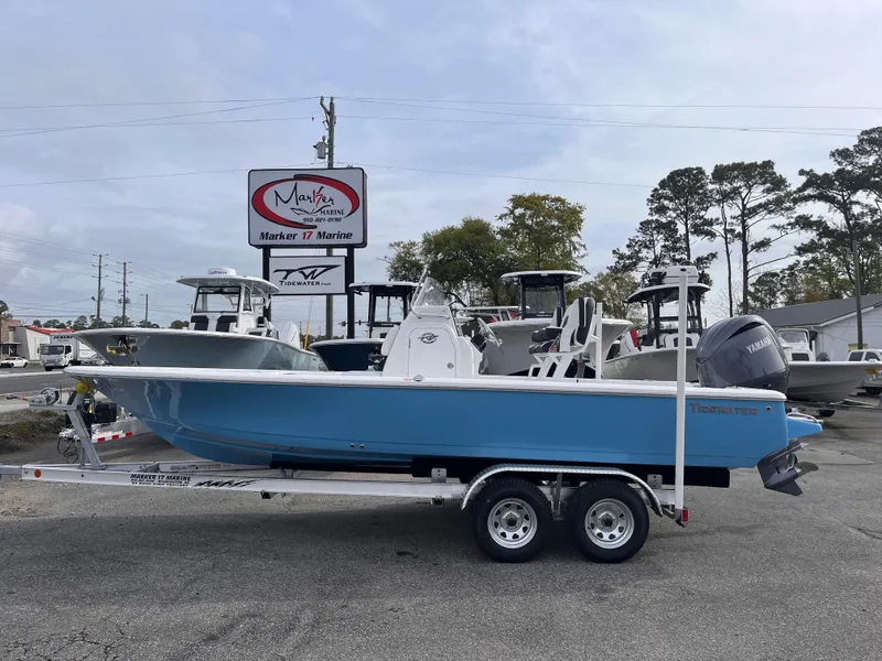 The Image of 2025 Tidewater 2110 Bay Max boat on trailer at dealership. - 0