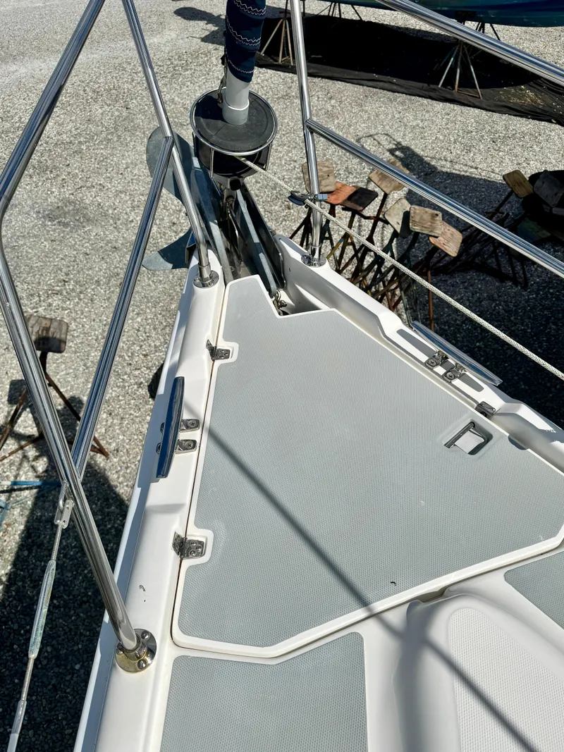 Slide: The Image of Deck of 2003 Hunter Passage 420 sailboat with stainless steel railings. - 11