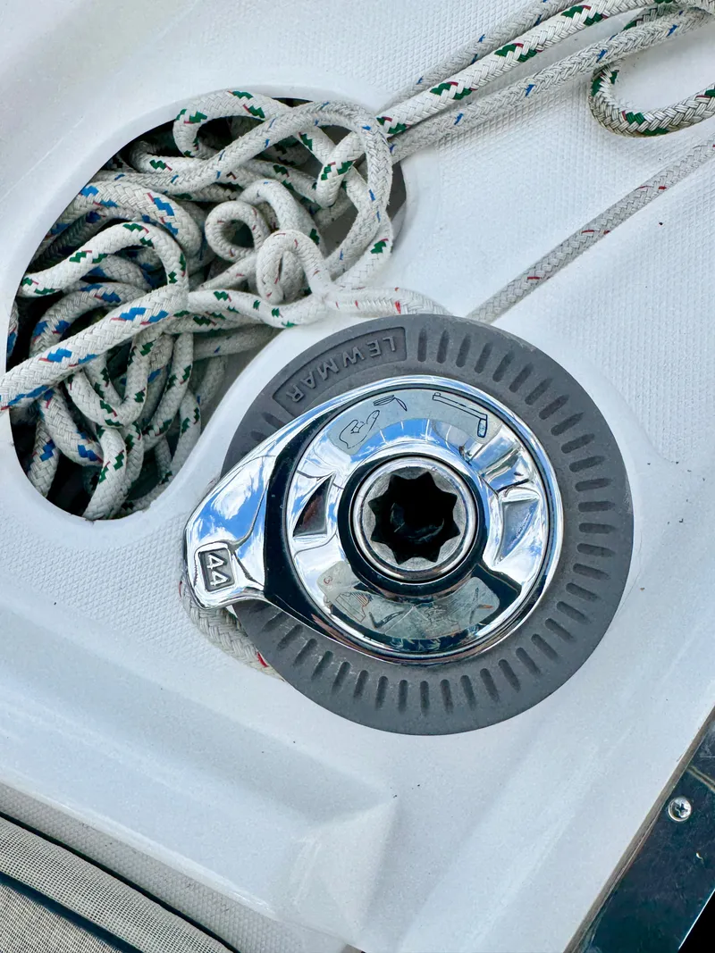 Slide: The Image of Winch on 2003 Hunter Passage 420 sailboat with coiled ropes. - 30