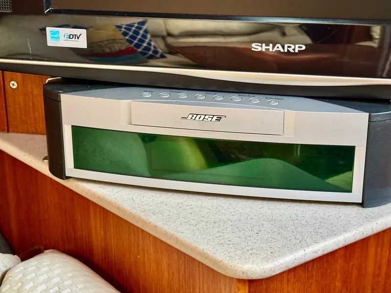 Slide: The Image of Bose sound system on a Hunter Passage 420 yacht, 2003 model, with Sharp TV above. - 48