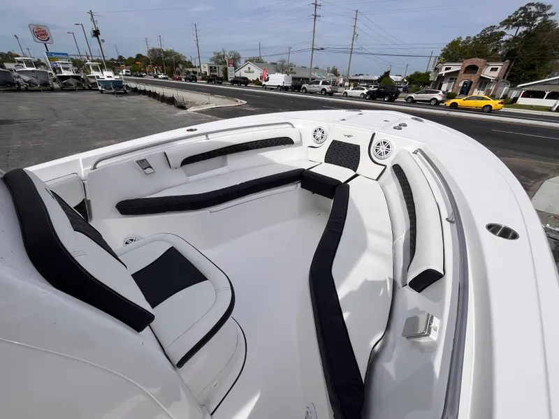 Slide: The Image of 2025 Tidewater 232 LXF boat interior with sleek seating and modern design. - 10
