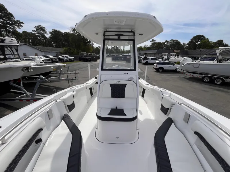 Slide: The Image of 2025 Tidewater 232 LXF boat with sleek white interior and modern design. - 11
