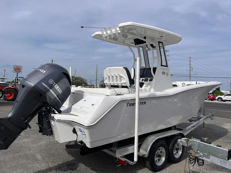Slide: The Image of 2025 Tidewater 232 LXF boat on trailer with Yamaha outboard motor. - 5