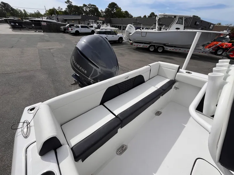 Slide: The Image of 2025 Tidewater 232 LXF boat with Yamaha outboard engine, featuring spacious seating and sleek design. - 6