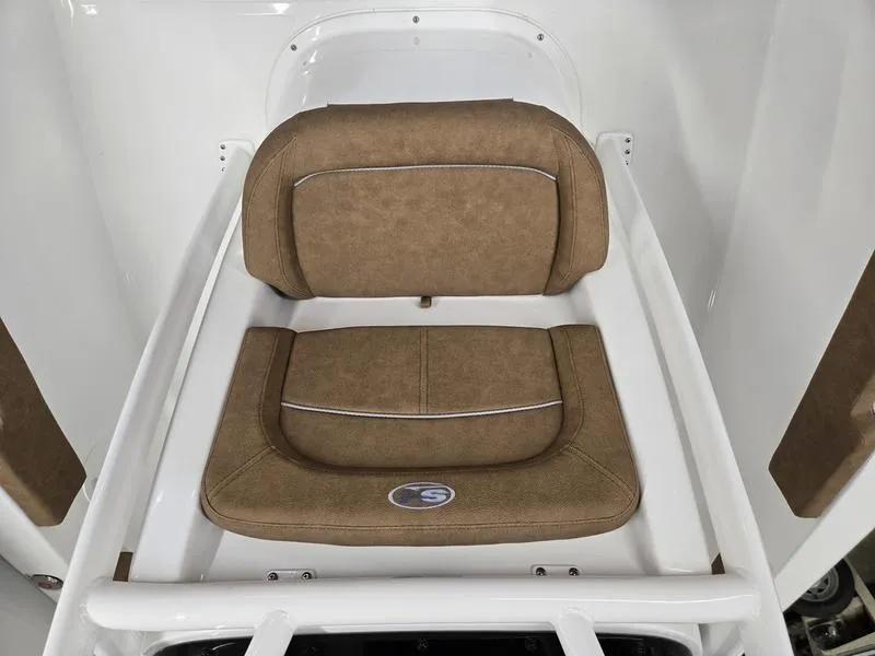 Slide: The Image of 2025 Sea Hunt Ultra 229 boat seat with brown cushioned upholstery. - 16