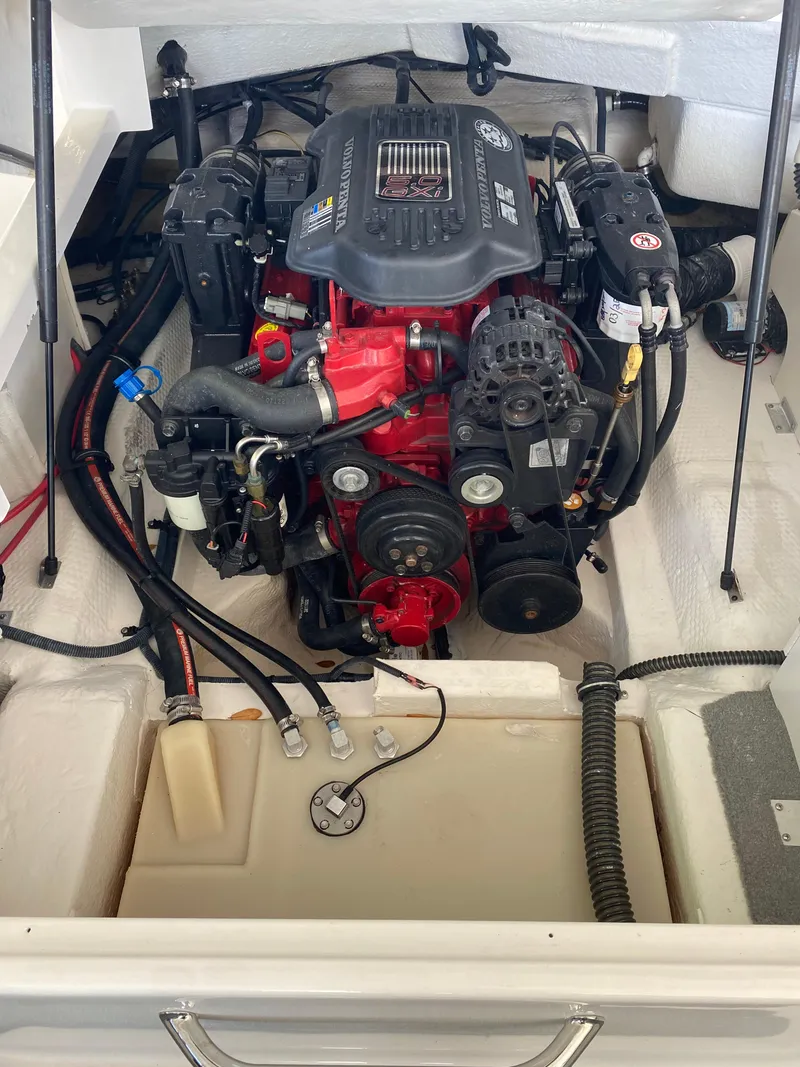 Slide: The Image of 2008 Regal 2200 Bowrider engine compartment with visible components and wiring. - 13