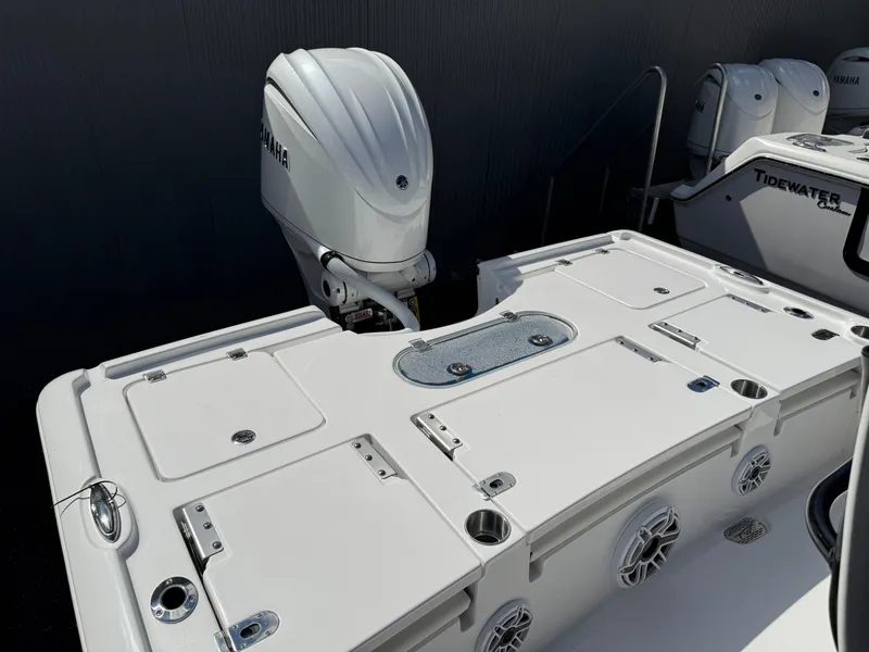 Slide: The Image of 2025 Tidewater 2500 Carolina Bay boat with Yamaha outboard motor, featuring a spacious deck. - 3