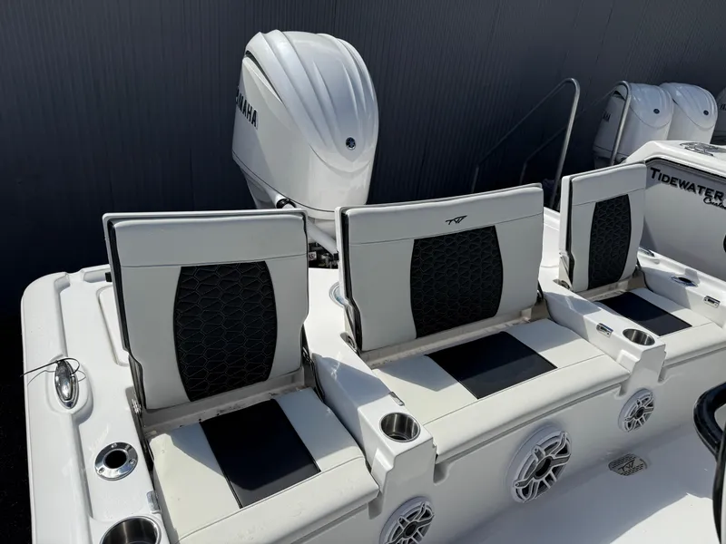 Slide: The Image of 2025 Tidewater 2500 Carolina Bay boat seats and Yamaha engine, showcasing modern design and comfort. - 4