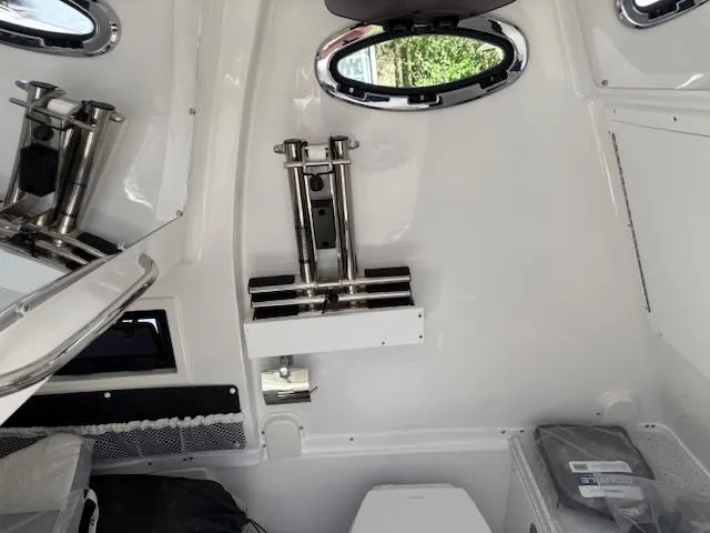 Slide: The Image of Interior of 2025 Tidewater 320 CC Adventure boat, featuring sleek design and modern fixtures. - 21
