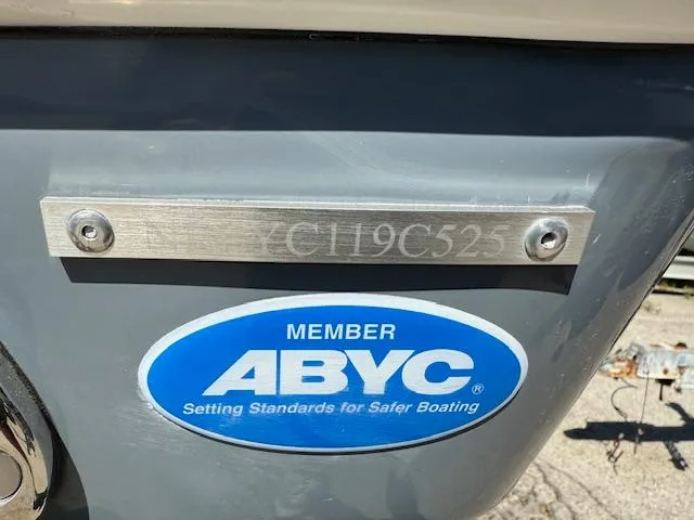 Slide: The Image of 2025 Tidewater 320 CC Adventure boat with ABYC membership plaque. - 25