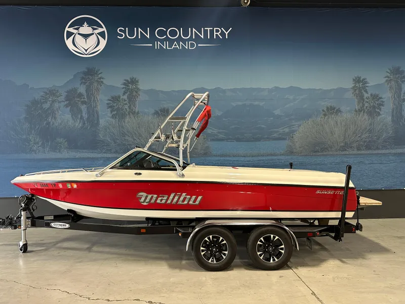 Slide: The Image of 2002 Malibu Sunsetter boat on trailer at Sun Country Inland showroom. - 0